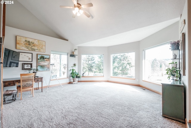 office featuring ceiling fan, vaulted ceiling, and carpet flooring