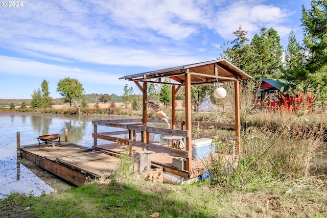 view of dock with a water view