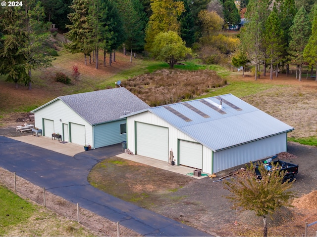 exterior space with a garage