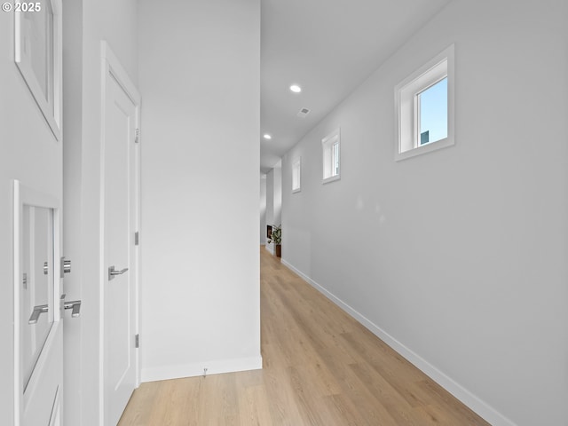 hallway featuring light wood-type flooring