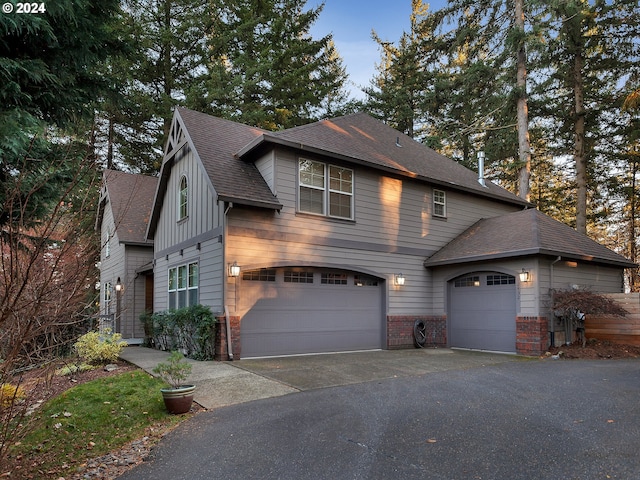 front of property with a garage