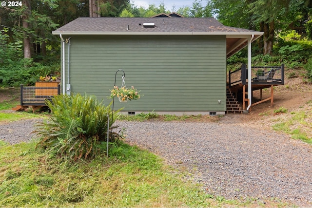 view of outbuilding with stairway