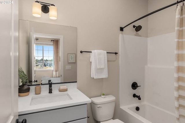 full bathroom with vanity, toilet, and shower / tub combo with curtain