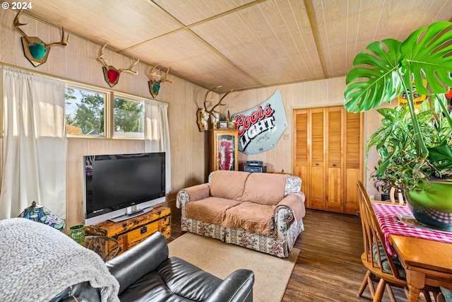 living room featuring wooden walls, wooden ceiling, and dark hardwood / wood-style flooring