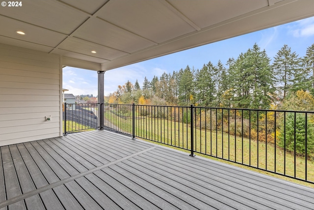 wooden deck with a yard