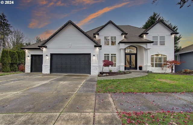 view of front of property with a garage