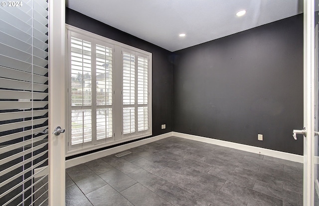 view of tiled spare room