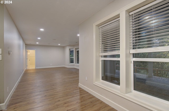 unfurnished room featuring hardwood / wood-style floors