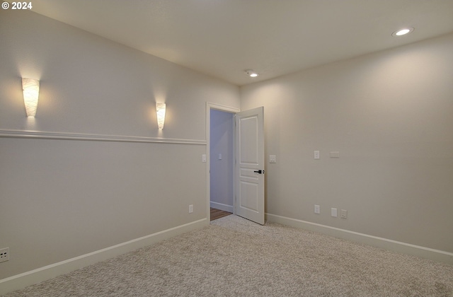 spare room featuring carpet flooring