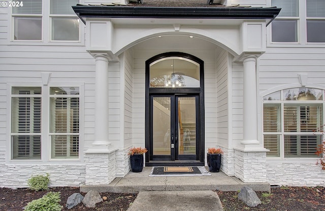 property entrance featuring french doors