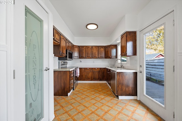 kitchen featuring sink and stainless steel appliances