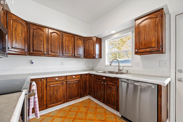 kitchen featuring appliances with stainless steel finishes and sink