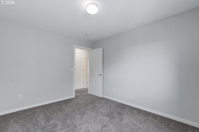 spare room with carpet flooring