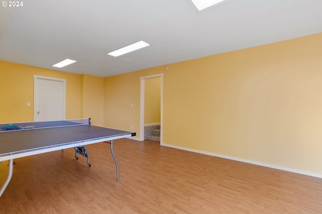 playroom with light wood-type flooring