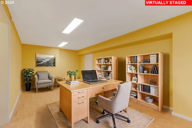 home office featuring light hardwood / wood-style flooring