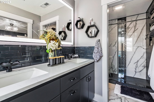 bathroom featuring vanity, tasteful backsplash, and walk in shower