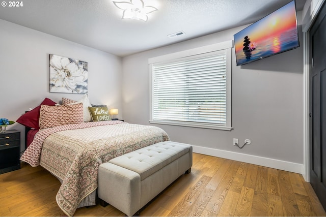 bedroom featuring light hardwood / wood-style flooring