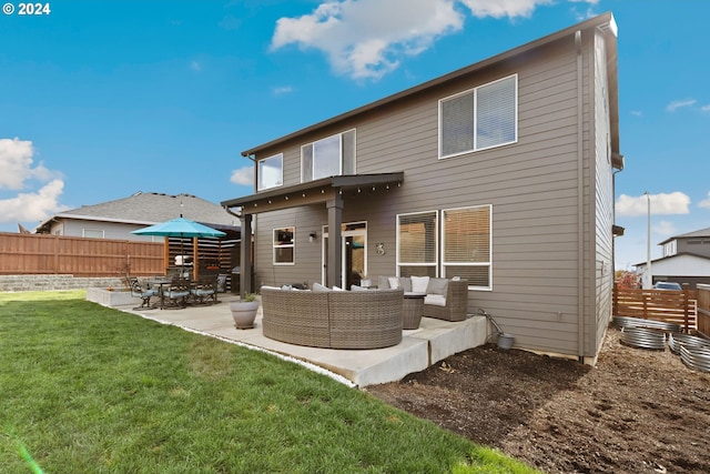 rear view of property with a lawn, a patio area, and an outdoor living space