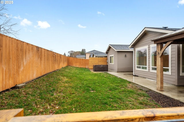 view of yard featuring a patio and a fenced backyard