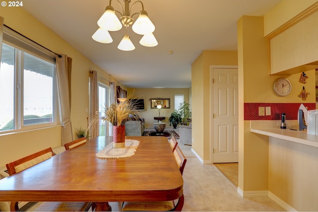 dining room featuring an inviting chandelier