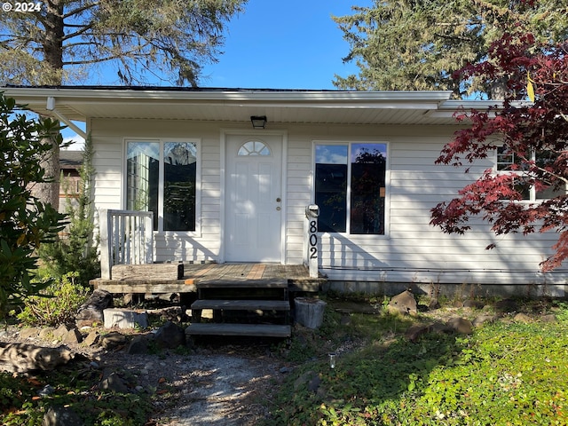 view of front of house with a wooden deck
