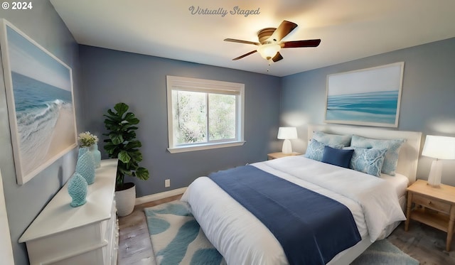 bedroom featuring ceiling fan and hardwood / wood-style floors