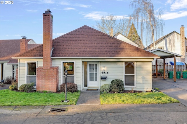 view of front of home with a front yard