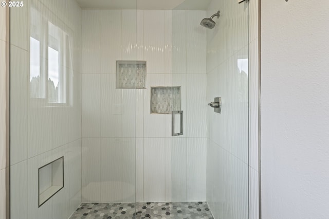 full bathroom featuring a stall shower