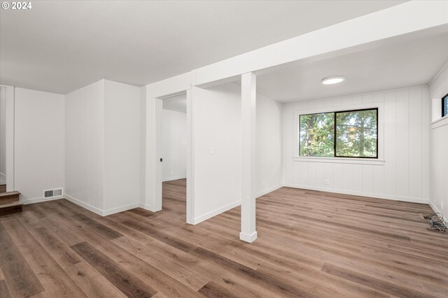 basement featuring hardwood / wood-style flooring