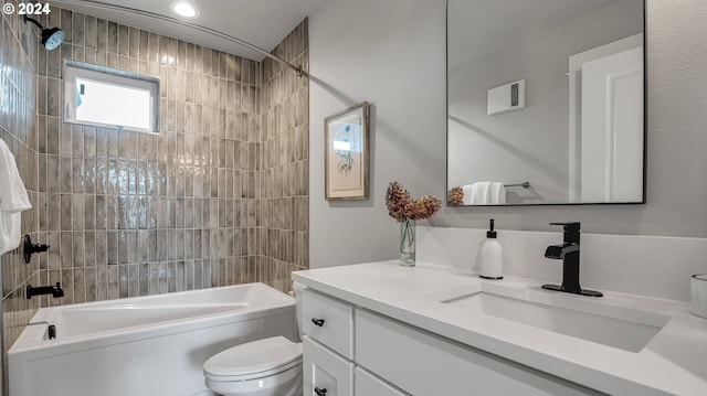 bathroom with visible vents, toilet, vanity, and washtub / shower combination