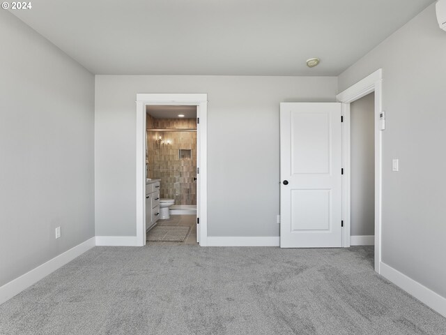 interior space with sink, dishwasher, white cabinetry, and backsplash