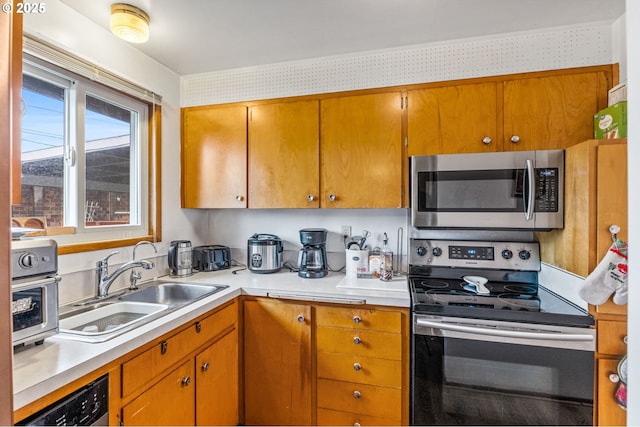 kitchen featuring sink and appliances with stainless steel finishes