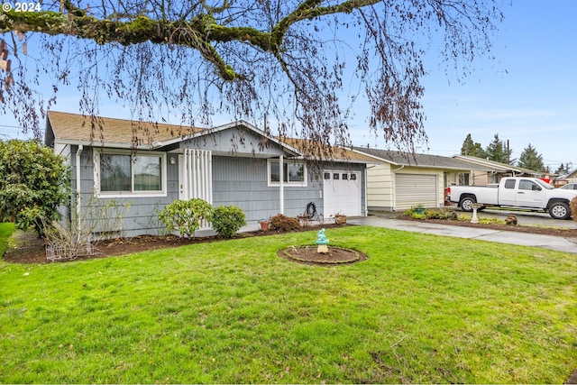 ranch-style home featuring a garage and a front lawn