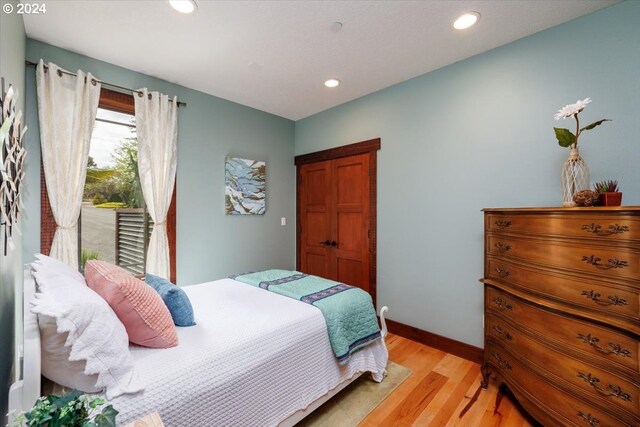 bedroom featuring light hardwood / wood-style flooring