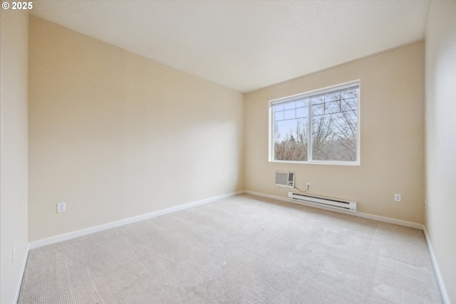 spare room with light carpet, baseboard heating, and an AC wall unit