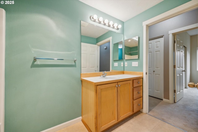 bathroom with vanity and tile patterned flooring