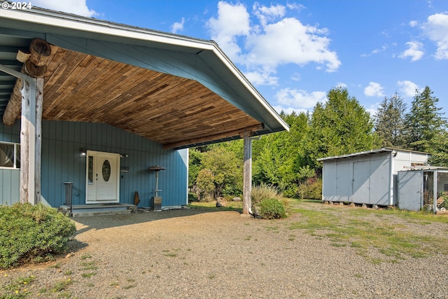 exterior space featuring a storage unit