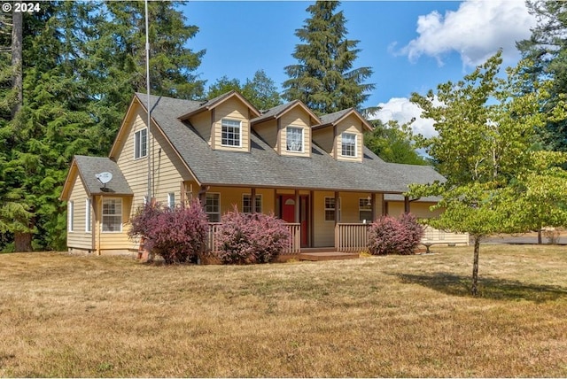 view of front facade featuring a front lawn and a porch