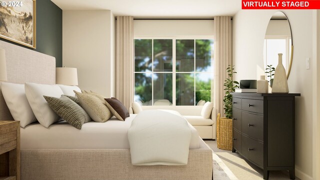 bedroom with light colored carpet