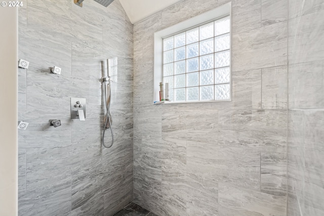 bathroom with tiled shower