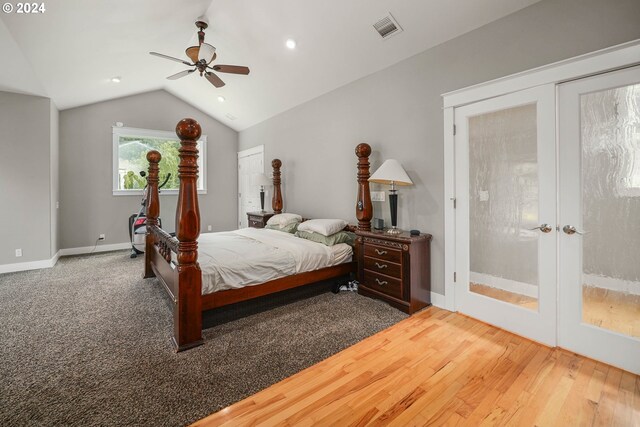 bedroom featuring lofted ceiling, ceiling fan, and hardwood / wood-style flooring