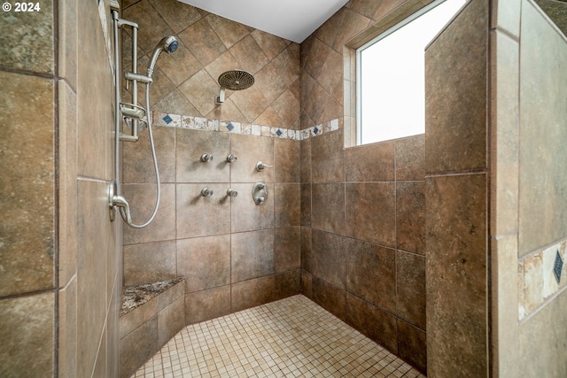 bathroom featuring tiled shower