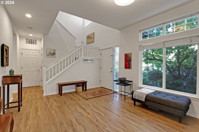 entryway with light hardwood / wood-style floors