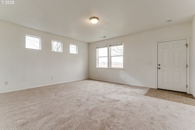 carpeted living room with a textured ceiling