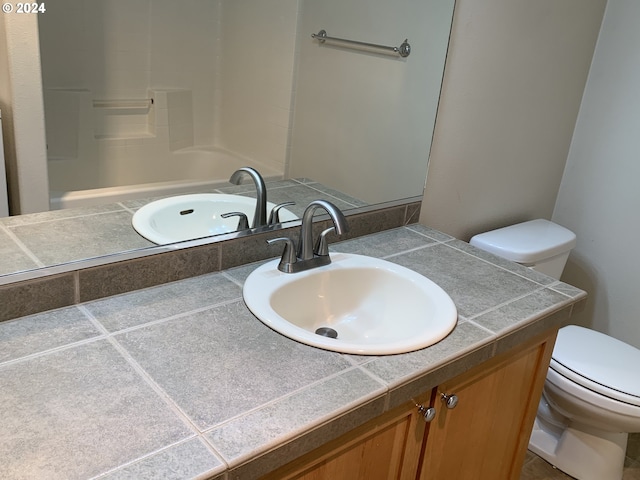 10733 NE Red Wing Way Unit 101, Hillsboro, OR 97006 - full bathroom with toilet, vanity, and shower / bath combination