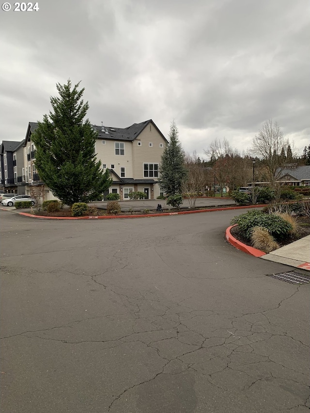 10733 NE Red Wing Way Unit 101, Hillsboro, OR 97006 - view of asphalt street featuring curbs and a residential view