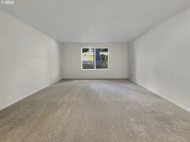 unfurnished room featuring carpet floors