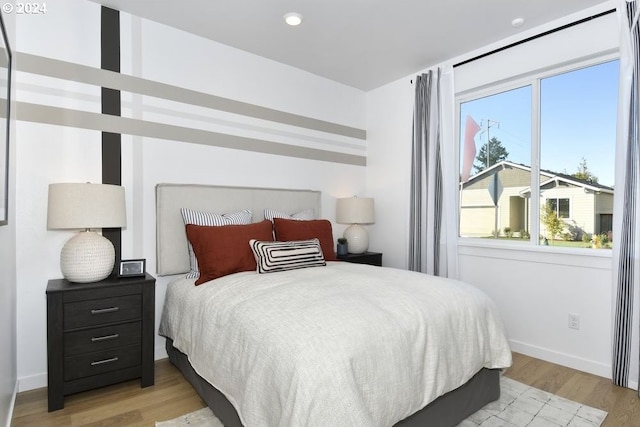 bedroom featuring light hardwood / wood-style flooring