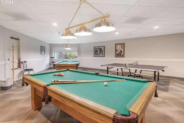 rec room with light colored carpet, a paneled ceiling, and pool table