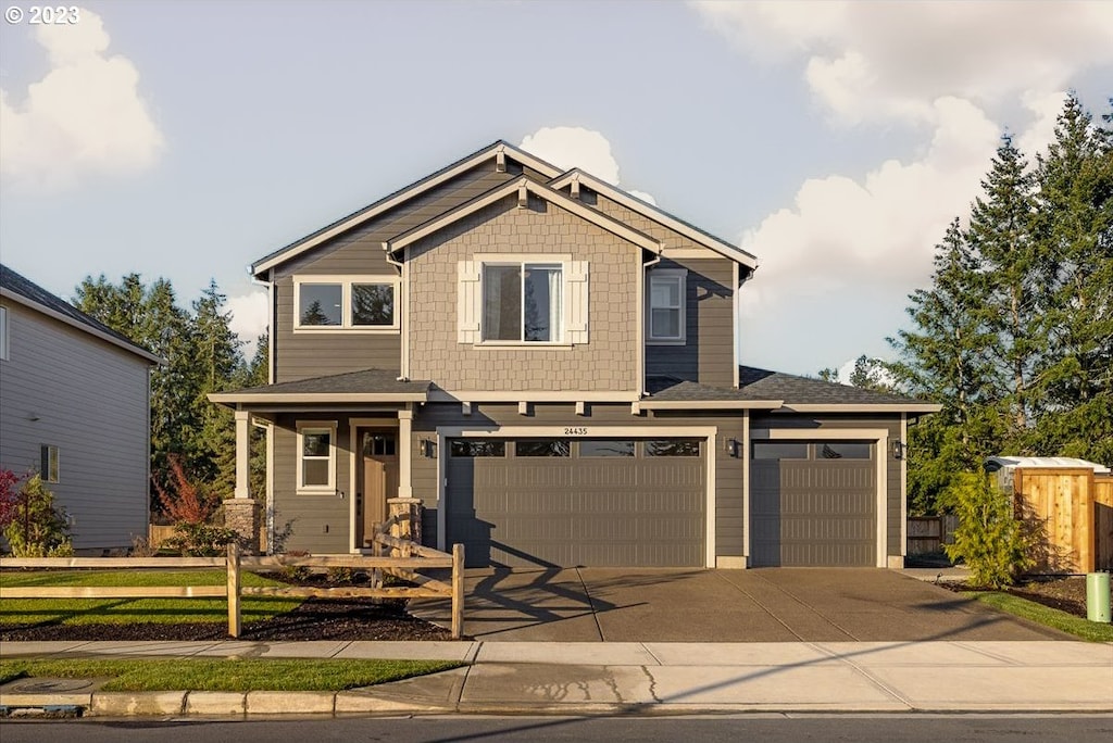 craftsman house featuring a garage